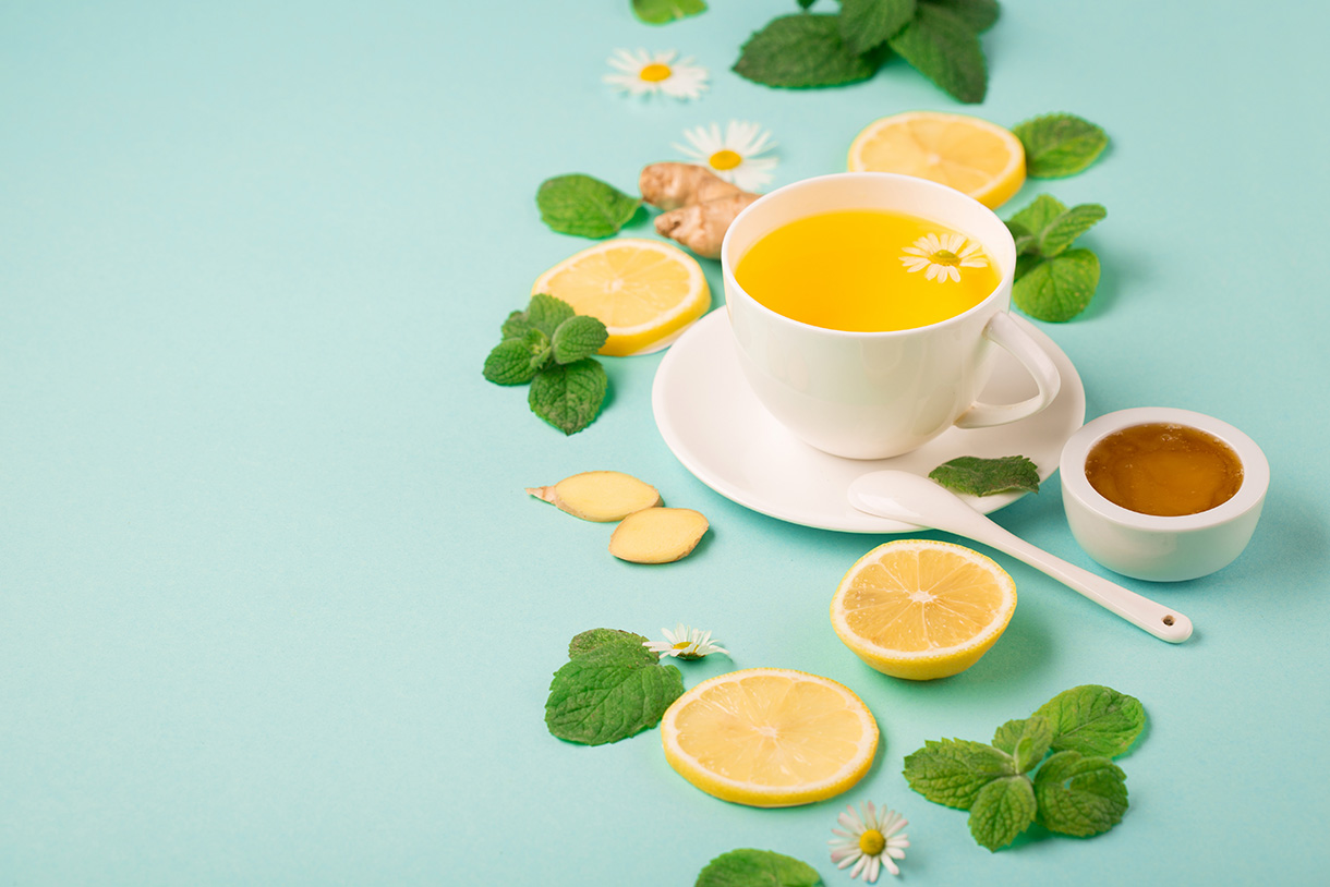 Herbal tea of chamomile flower with mint, ginger, lemon, honey o